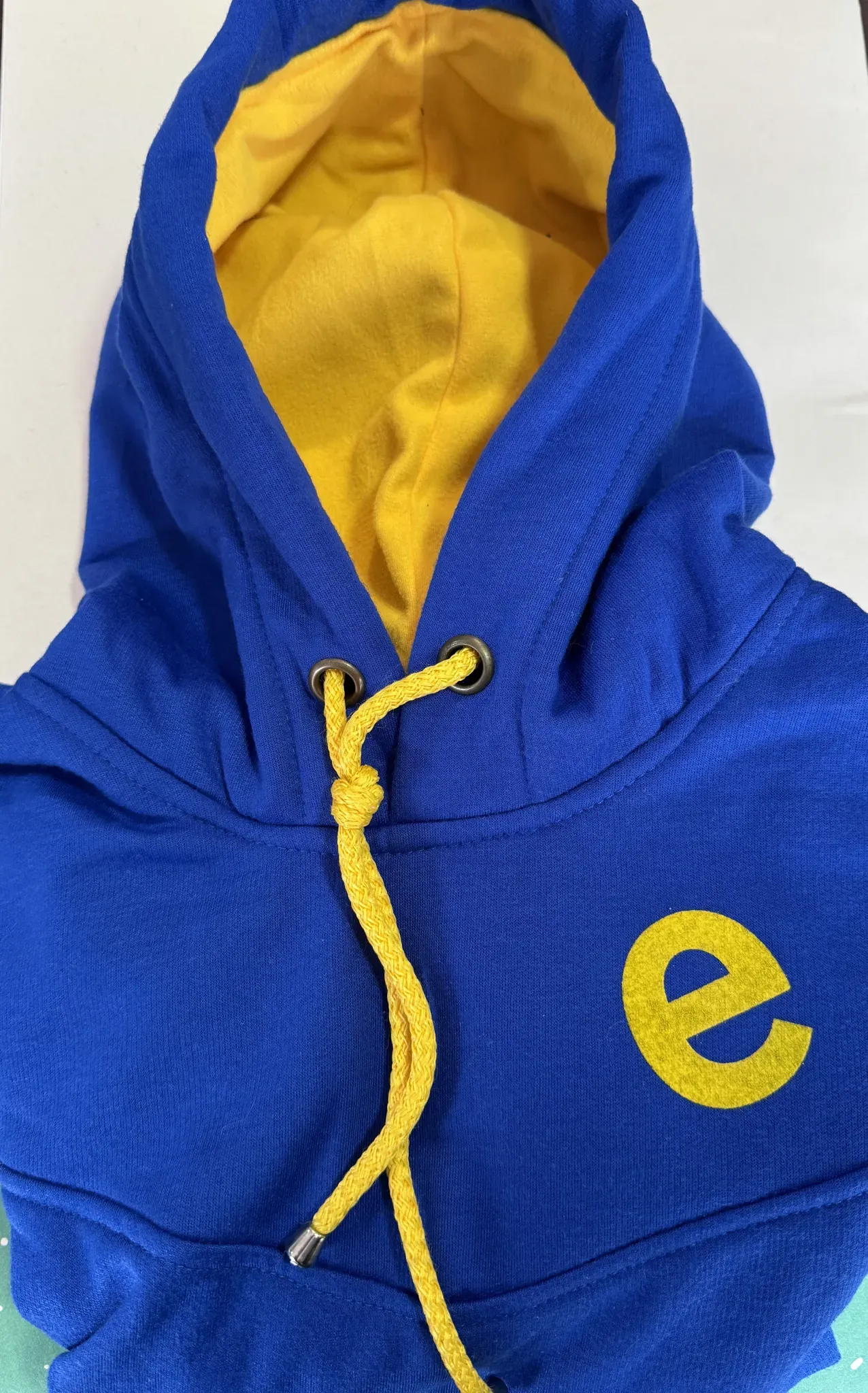 Buzo con capota y dos cremalleras para niño