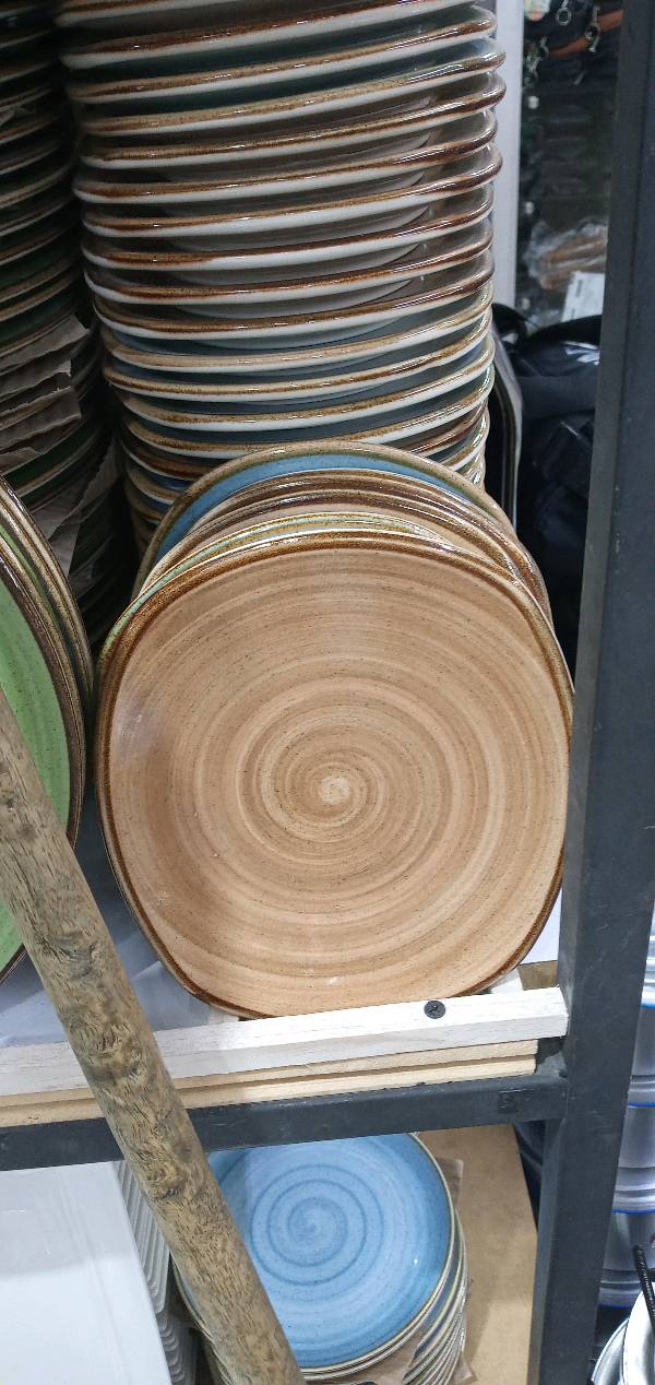 potter's_wheel, plate_rack, wooden_spoon