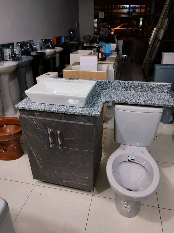 Combo muebles de baño con repisa mas Inodoro y cisterna 