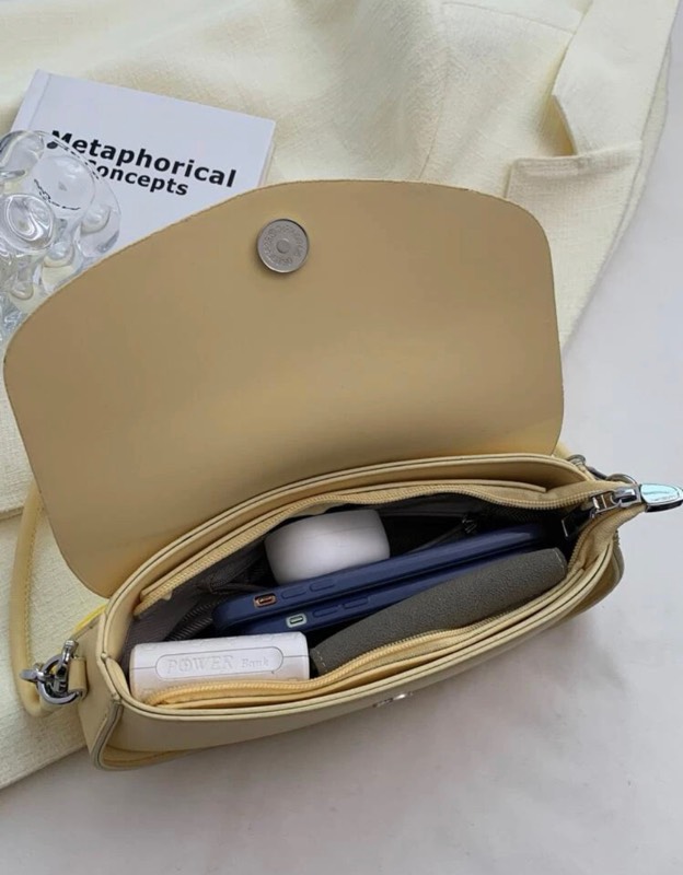 purse, mailbag, cellular_telephone