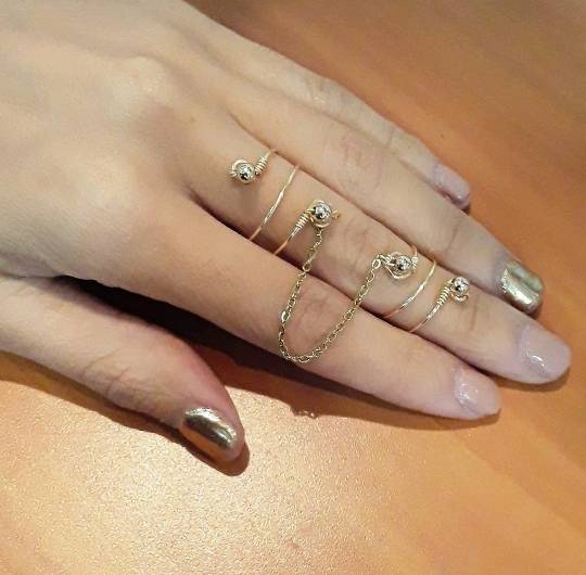 Anillos unidos con cadenas store