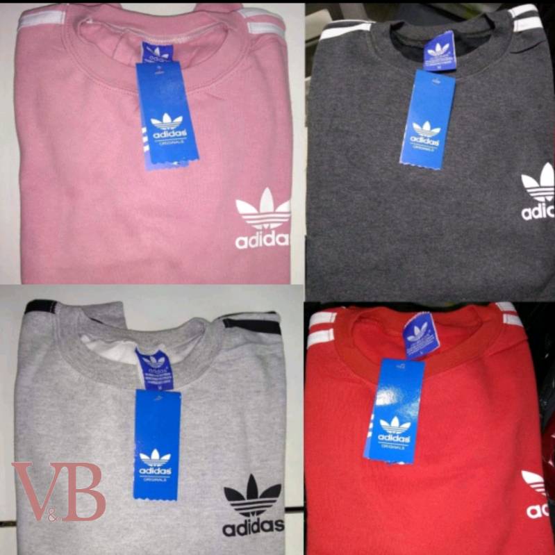 Buzo adidas retro. Unisex en Castelar