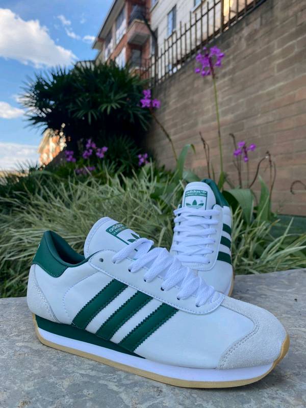 Adidas country top precio