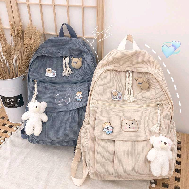 Mochilas Tela De Pana Con Peluche Guindando en Cuenca