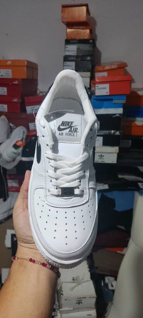 Nike blancos paloma negra 2025
