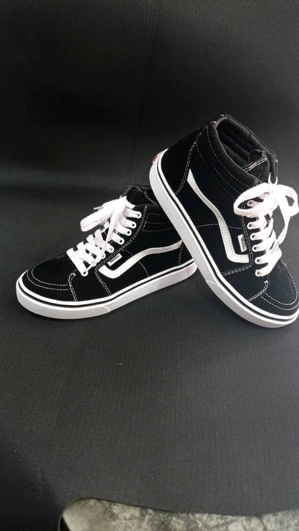 Vans blancas raya negra clearance