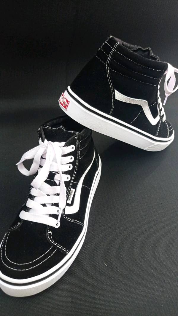Vota Vans negra raya blanca