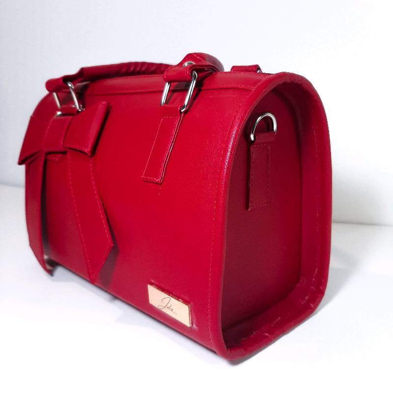 Cartera tipo ba l color rojo en Cali