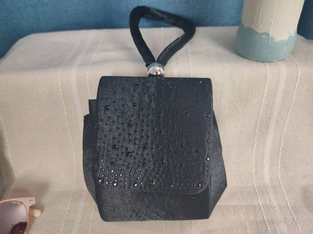 Cartera online sei negra