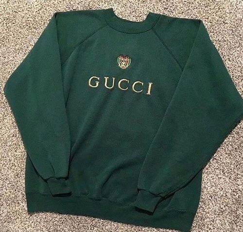 Buzo gucci precio store