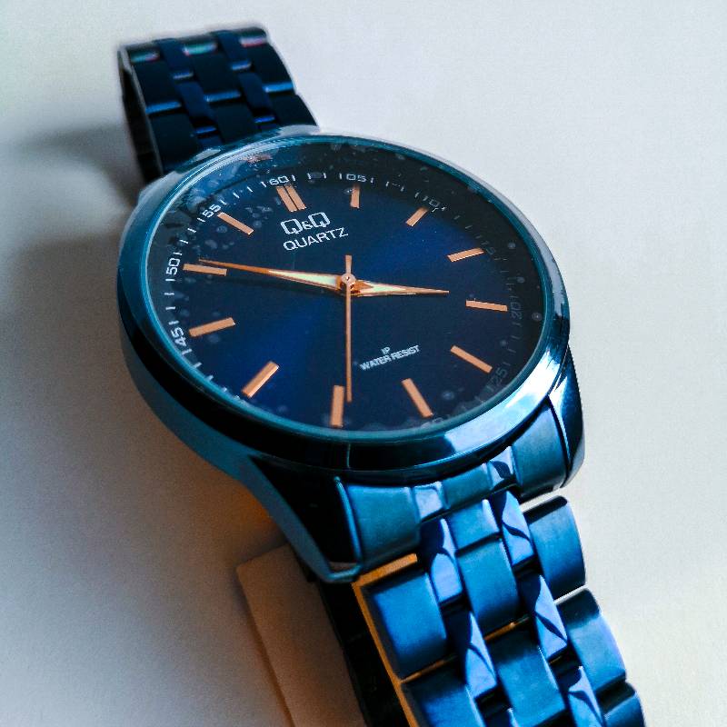 Reloj q&q azul deals