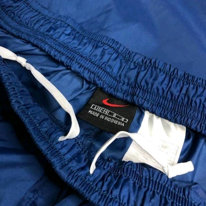 Buzo nike cortaviento sales