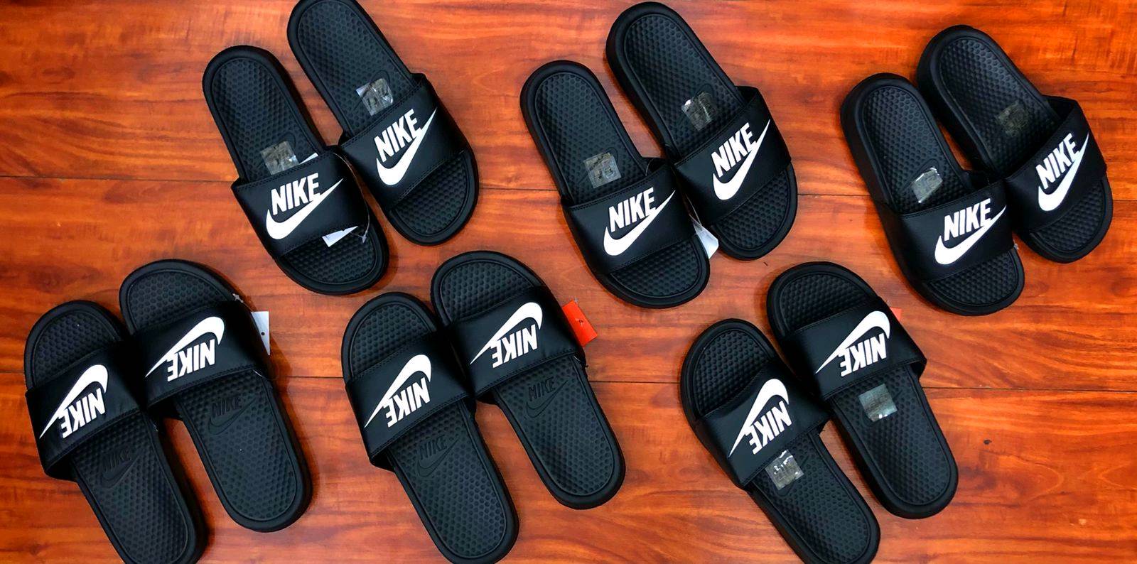 Precio de chancletas nike deals