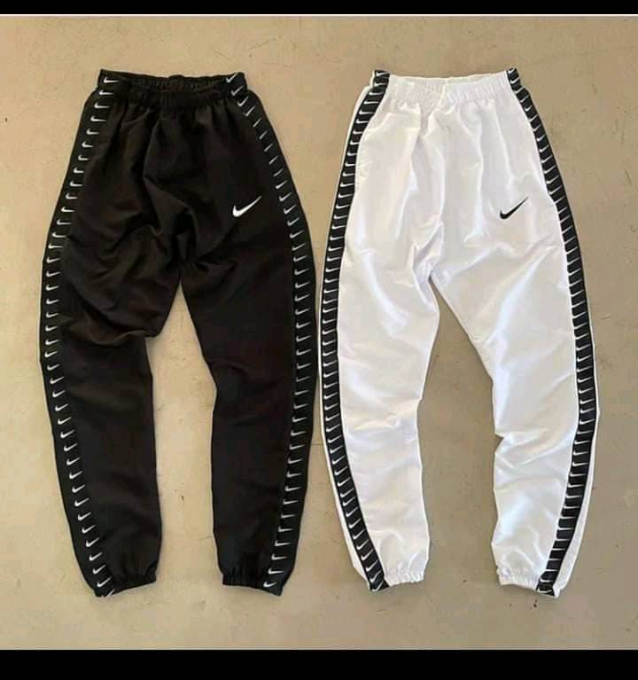 Pantalones Nike rompe viento