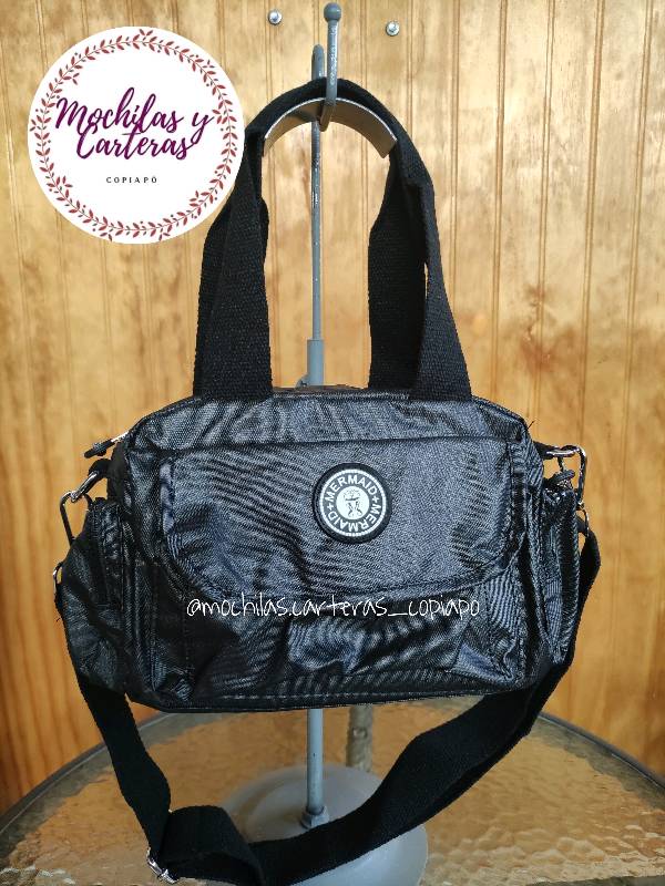 Bolso estilo kipling con tapa metalizado NEGRO en Copiap