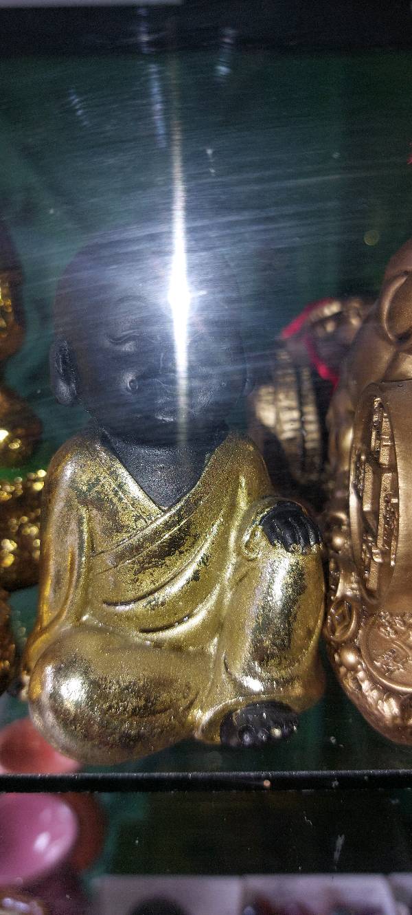 Buda sonriente mediano en Cajamarca