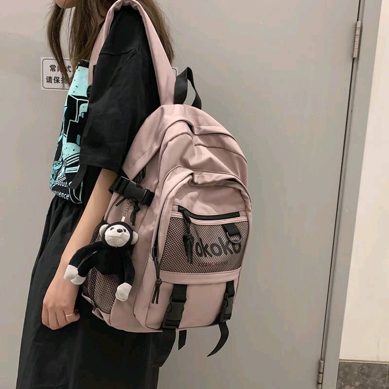 Mochila con 2025 llavero de mono