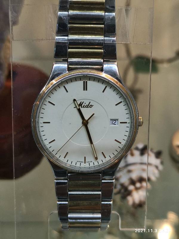 Reloj mido shop quartz precio