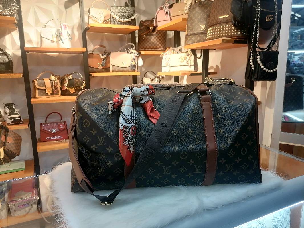 Maleta lv precio deals
