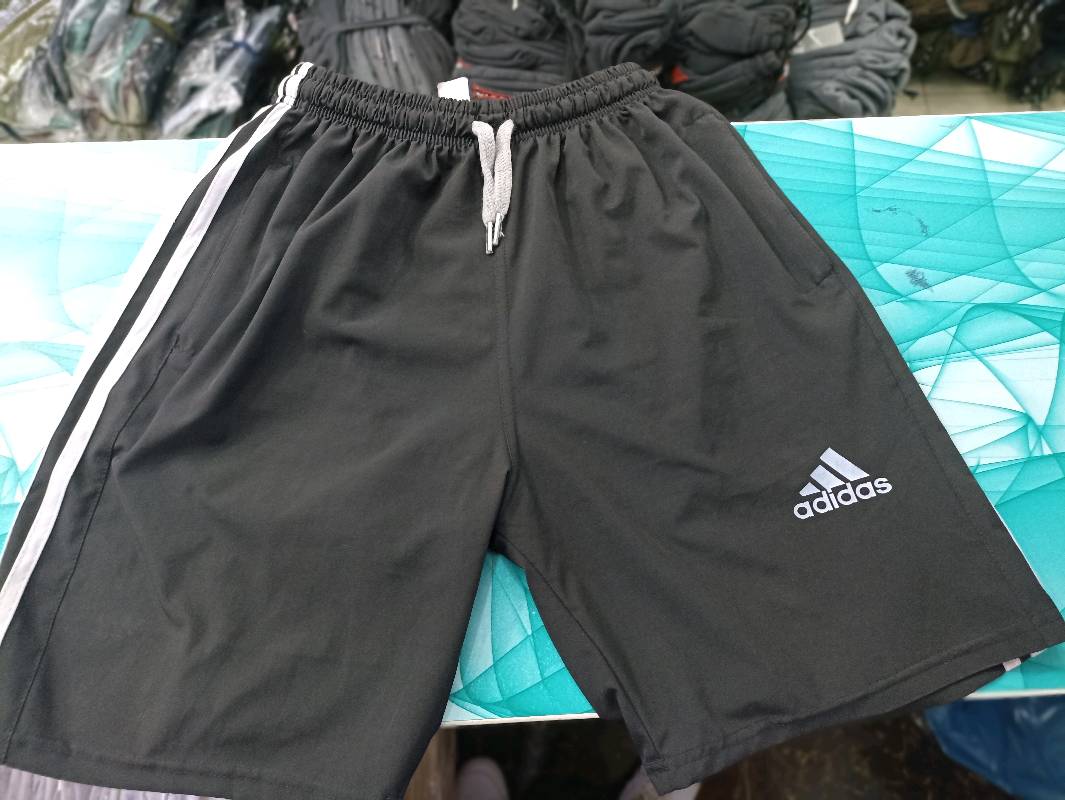 Short tela hotsell mojada hombre