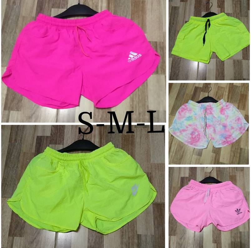 Shorts dama tela mojada