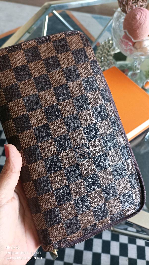 Chequera louis vuitton deals
