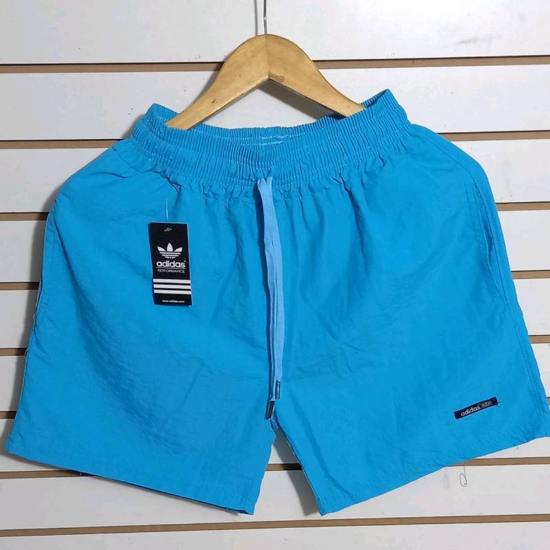 Short de tela para hombres hot sale
