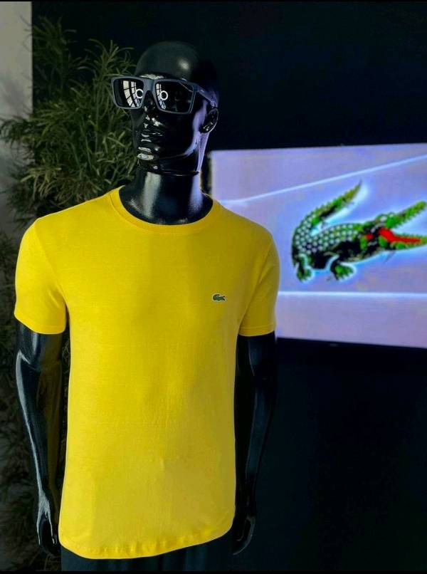 Remera store lacoste amarilla
