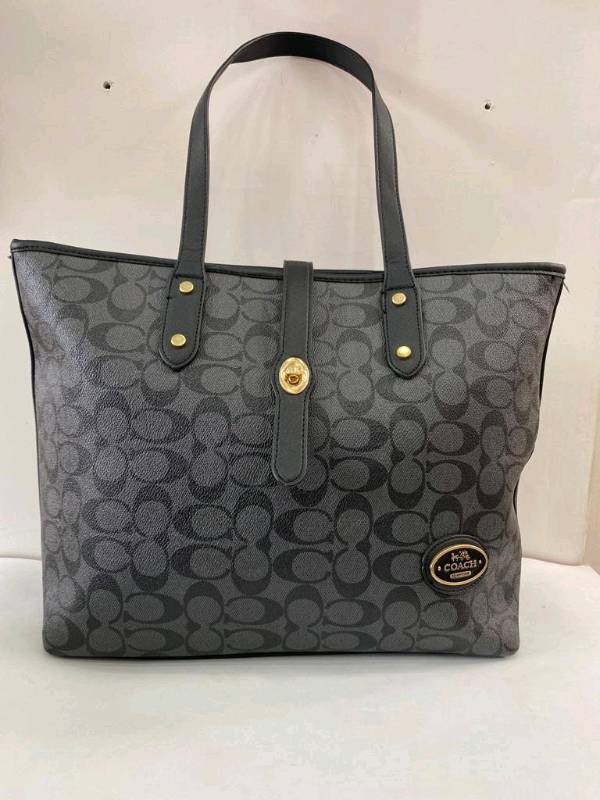 Bolsa coach negra con flores outlet