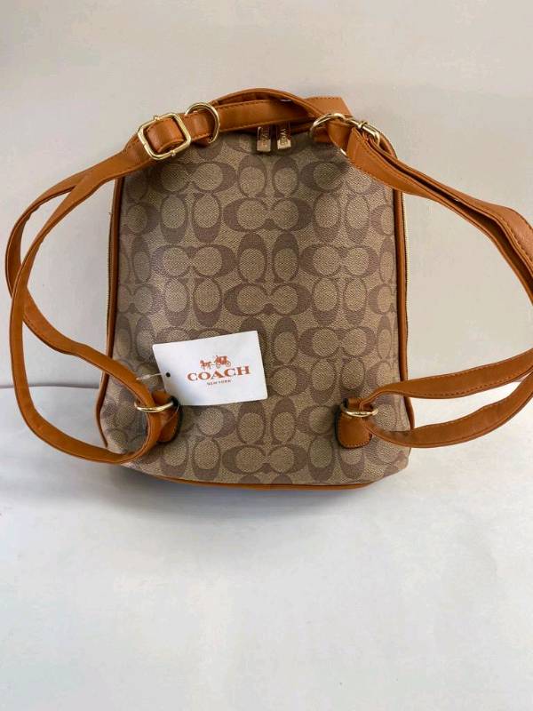 Mochila coach 2025 cafe